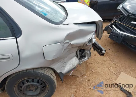 2001 Toyota Corolla Le z USA, uszkodzony, nr VIN 2T1BR12E71C507692